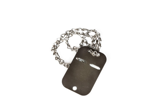 Blank steel dog tag with chain isolated on white background.