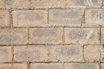 Gray grunge bricks. The brick wall is the color of iron