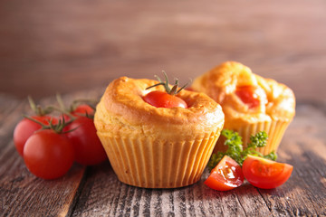 tomato pastry and spice on wood background- appetizer, finger food, snack