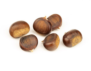 Chestnuts with shell isolated on white background, a pile of fresh chestnuts
