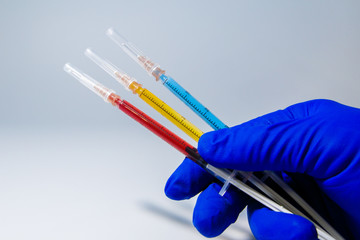 The concept of medical injections for cosmetology and new invented drugs. A set of medical syringes...