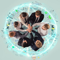 Handshaking business person above a round and ccreative drawing. concept of teamwork and...
