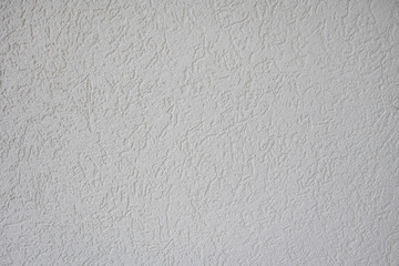 A rough white wall.