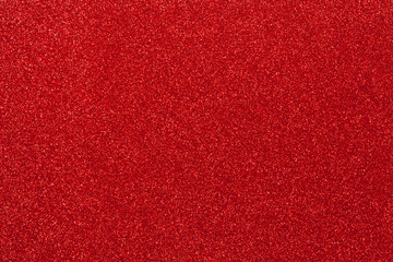 Red glitter texture. top view