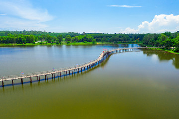 Aerial view of wood bridge cross the river and blusky with cloud in Chumphon province.