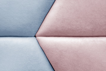 Pink and blue velvet texture or background. Soft panels on the wall or headboard.