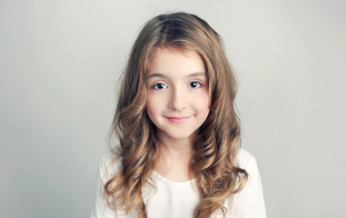 Naklejka premium Child girl portrait,caucasian beautiful kid with long hair closeup.