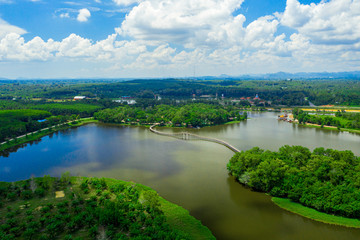 Fototapeta na wymiar Aerial view of natural reservoir with green nature in Chumphon province, Thailand.
