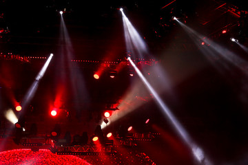 Fototapeta na wymiar Red light on a rock concert stage as background