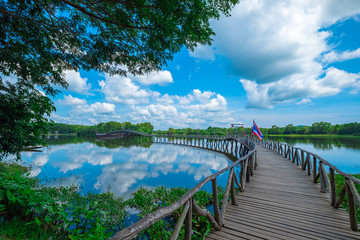 Wood bridge cross the river and blusky with cloud  in Chumphon province.
