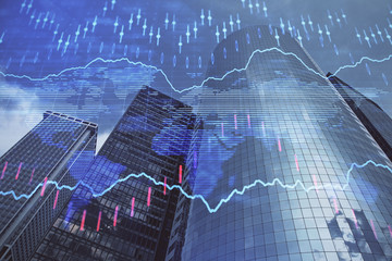 Forex chart on cityscape with skyscrapers wallpaper multi exposure. Financial research concept.