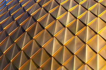 Golden coating on the roof as a background