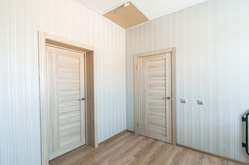 Obraz na płótnie Canvas Russia, Moscow- May 29, 2019: interior room apartment. standard repair decoration in hostel. room doors, repair