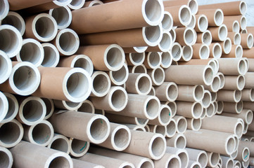 stack of  pipe-shaped cardboard core