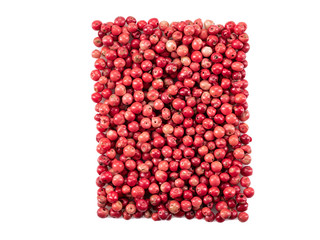 Pink and red peppercorns isolated on white background with copy space for text or images. Spices and herbs. Packaging concept. Close-up. - Powered by Adobe