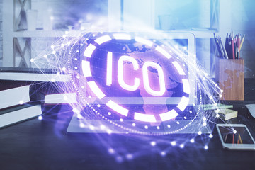 Multi exposure of blockchain theme hologram and table with computer background. Concept of bitcoin crypto currency.