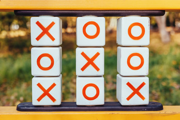 Children's playground with tic tac toe game stand