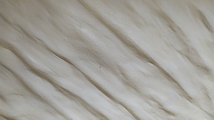 Uneven cement wall White painted by a builder