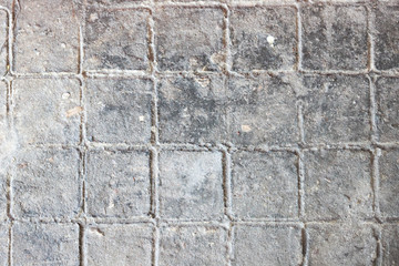 Gray brick arranged in same pattern - diagonal view.