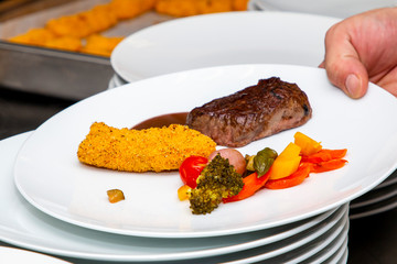 french dish breaded beef with vegetables and potatoes