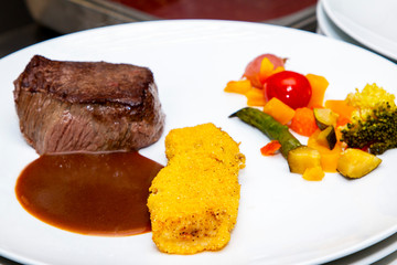 french dish breaded beef with vegetables and potatoes