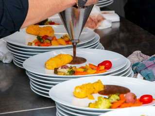 french dish breaded beef with vegetables and potatoes