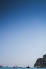Boats, ocean bay, sky and clouds