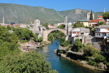Fototapeta na wymiar The city of Mostar viewed from Lucki most bridge, with the Old Bridge (Stari Most), the Neretva river and the medieval town, Mostar, Bosnia and Herzegovina