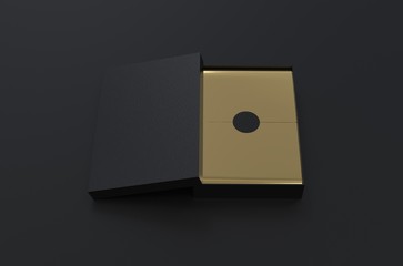 Black Box with gold wrapping paper and black label sticker, mock up template on black background,...