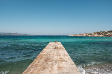 Fototapeta na wymiar Old jetty at Cavallo Island in Corsica