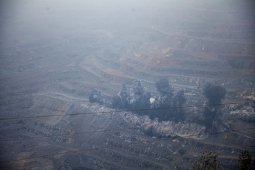 Fototapeta na wymiar massive explosion in iron ore quarry 3