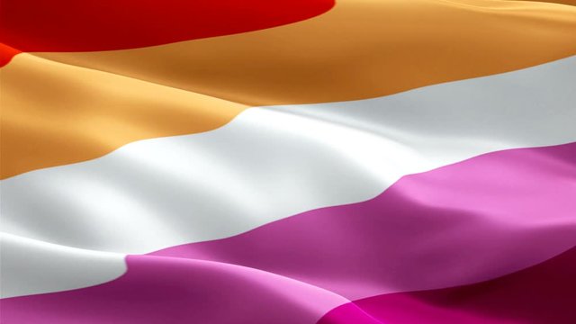 Rainbow Orange Lesbian Pride Flag video waving in wind. Butch Lesbian Flag background. Rainbow Pride LGBT Butch Lesbian Flag Looping Closeup 1080p Full HD 1920X1080 footage. Rainbow colors LGBT Labrys