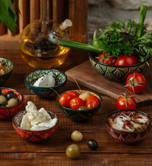 side dishes for lunch in small bowls with traditional patterns