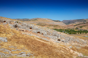Fototapeta na wymiar Aerial view of Pirin Ruins. Perre antik kenti, a small town of Commagene Kingdom later an important local center of the Roman Empire. Small town and necropolis. Adiyaman. Turkey