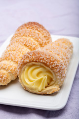 Filled with yellow cream homemade horn pastry