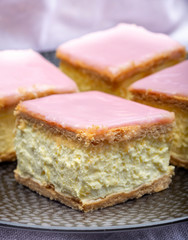 Tompoes or tompouce, iconic pastry in Netherlands and Belgium made from puff dough, icing, cream