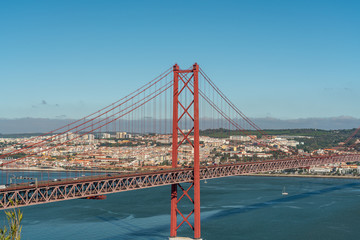 April 25 bridge with a view of Lisbon, in the summer. Portugal.