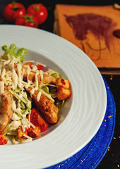 close up of half of the caesar salad