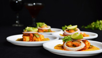 paneer tikka masala in taco shells closeup dish