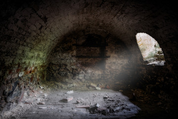 Abandoned empty old dark underground vaulted cellar