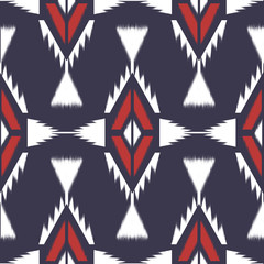 Fototapeta na wymiar Ikat Seamless Pattern Design. Ethnic fabric. Bohemian fashion. Vector illustration.