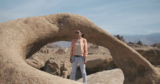 girl, arch in the Alabama hills