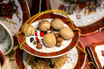 Hazelnuts and walnuts on a plate.