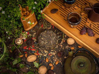 Preparation of the tea ceremony, tea in the bowl. Handmade cups