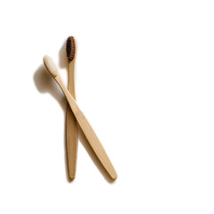 Two bamboo toothbrush isolated on white background. Zero waste concept.