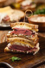 Ruben sandwich. New York sandwich with pastrami, sauce 1000 islands and sauerkraut.