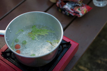 Broth is hot and boiling, Camping style cooking, Copy-space