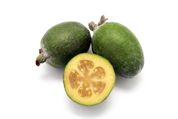 feijoa cut in half, on a white background close-up