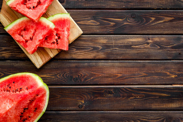 Pieces of watermelon on wooden background top view space for text - Powered by Adobe