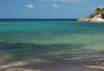 The multicoloured waters of the Thong Land Beach, Koh Phangan, Thailand